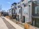 Charming townhouse row with welcoming entrances and stylish architectural details at 3520 W Conejos Pl # 11, Denver, CO 80204