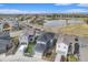 Lakefront community with a recreational park promotes outdoor living, enhancing its desirability and appeal to potential homeowners at 10610 Reunion Pkwy, Commerce City, CO 80022