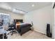 Well-lit bedroom featuring neutral walls and comfortable carpeting at 745 N Tempe St, Aurora, CO 80018