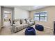 Bonus room featuring comfortable theater seating, and two bean bag chairs, perfect for entertaining at 745 N Tempe St, Aurora, CO 80018