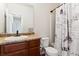 Well-lit bathroom with a vanity, toilet, and a shower/tub combination, perfect for a quick refresh at 9533 Cherry Ln, Thornton, CO 80229
