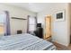Spacious bedroom showcases natural light and soothing decor at 9533 Cherry Ln, Thornton, CO 80229