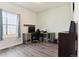 Functional office space featuring a large window and contemporary design at 9533 Cherry Ln, Thornton, CO 80229