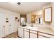 Efficient kitchen with a breakfast bar and modern appliances at 12820 Ironstone Way # 103, Parker, CO 80134
