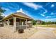 Community pavilion with mailboxes and an outdoor volleyball court at 12820 Ironstone Way # 103, Parker, CO 80134