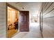 Exterior hallway with door ajar, revealing storage space at 12820 Ironstone Way # 103, Parker, CO 80134