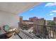 Balcony features outdoor seating and views of the surrounding buildings and neighborhood at 2 Adams St # 806, Denver, CO 80206