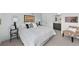Inviting bedroom featuring a comfortable bed, neutral decor, and access to an ensuite bathroom at 2 Adams St # 806, Denver, CO 80206