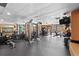 Community gym with fitness equipment and pool access at 2 Adams St # 806, Denver, CO 80206