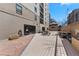 Condo patio area with ample seating features multiple surface types to enjoy the sunny Colorado weather at 2 Adams St # 806, Denver, CO 80206