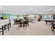 Spacious recreation room features several activities including a pool table, ping pong table, and lounge area at 2 Adams St # 806, Denver, CO 80206