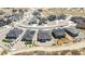 A neighborhood featuring modern homes with well-maintained landscaping, set in a peaceful community at 1581 Diamond Hill Ct, Castle Rock, CO 80104