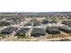 Expansive aerial view of a neighborhood with modern homes, showcasing the community's layout and design at 1581 Diamond Hill Ct, Castle Rock, CO 80104