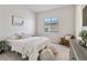 Cozy bedroom with a comfortable bed, accent chair, and soft textures creating a serene atmosphere at 1581 Diamond Hill Ct, Castle Rock, CO 80104