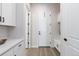 Mudroom features built-in storage, bench seating, and an exterior door at 1581 Diamond Hill Ct, Castle Rock, CO 80104
