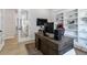 Bright office with a large wooden desk, built-in bookcase, and French doors to add architectural interest at 1581 Diamond Hill Ct, Castle Rock, CO 80104