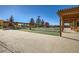 Outdoor bocce ball court featuring covered seating areas and well-maintained synthetic surface at 23738 E Clifton Pl, Aurora, CO 80016