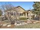 Attractive single-Gathering home featuring a stone facade, manicured landscaping, and inviting entrance at 23738 E Clifton Pl, Aurora, CO 80016