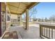 Spacious covered front porch offering a relaxing outdoor space with neighborhood views at 23738 E Clifton Pl, Aurora, CO 80016