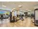 Spacious gym featuring modern exercise equipment and ample natural light at 23738 E Clifton Pl, Aurora, CO 80016