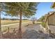 Beautifully landscaped yard with mature trees, shrubs and view of the golf course at 23738 E Clifton Pl, Aurora, CO 80016
