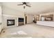 Inviting living room featuring a fireplace and open layout for seamless entertaining at 23738 E Clifton Pl, Aurora, CO 80016
