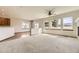 Bright and airy living room featuring large windows and neutral decor at 23738 E Clifton Pl, Aurora, CO 80016