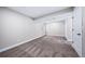 Nicely finished basement bedroom featuring carpet flooring, window and a closet at 4064 S Olathe Ct, Aurora, CO 80013