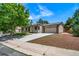 Spacious home featuring a two-car garage and a well-maintained front yard at 4064 S Olathe Ct, Aurora, CO 80013