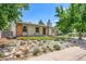 Beautiful single-Gathering house with a manicured front yard and unique rock garden feature at 4064 S Olathe Ct, Aurora, CO 80013