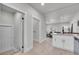 Inviting living room featuring hardwood floors, recessed lighting, and an open layout design at 8801 E 16 Ave, Denver, CO 80220