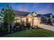 Attractive home with a well-kept lawn and a two-car garage at 19688 E 52Nd Ave, Denver, CO 80249