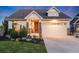 Charming single-Gathering home featuring a well-manicured lawn and a two-car garage at 19688 E 52Nd Ave, Denver, CO 80249