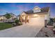 Lovely single-Gathering home with a stone-accented facade and attached two-car garage at 19688 E 52Nd Ave, Denver, CO 80249