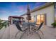 Wonderful outdoor space with patio and outdoor kitchen provides relaxing views of sunset and golf course at 19688 E 52Nd Ave, Denver, CO 80249