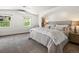 Spacious bedroom with neutral tones, ample natural light, and scenic views at 2571 Sw Grapevine Rd, Idledale, CO 80453