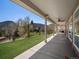 Enjoy the outdoors on this large covered patio with scenic backyard views at 2571 Sw Grapevine Rd, Idledale, CO 80453