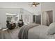 Vaulted ceiling, two recliners, and a view of the trees are great features of this comfortable main bedroom at 2571 Sw Grapevine Rd, Idledale, CO 80453