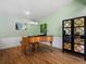 Elegant room with hardwood floors, piano, and modern decor at 2571 Sw Grapevine Rd, Idledale, CO 80453