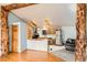 Bright kitchen with stainless steel appliances, unique lighting, and wooden accents at 441 Johnson St, Frederick, CO 80530