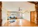 Inviting living room with hardwood floors, stylish furnishings, and lots of natural light at 441 Johnson St, Frederick, CO 80530