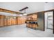 Finished basement with bar and stools, classic wood paneling, and a full bathroom for added convenience at 9590 Lowell Blvd, Westminster, CO 80031
