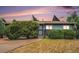 Charming single-story home with a well-manicured lawn and mature landscaping at 9590 Lowell Blvd, Westminster, CO 80031