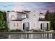 Charming two-story home with light-blue siding, well-manicured landscaping, and eye-catching curb appeal at 14107 Deertrack Ln, Parker, CO 80134