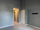 Bedroom features neutral carpet, paint and trim, and interior doors at 12304 W Cross Dr # 304, Littleton, CO 80127