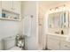 Bathroom with a shower and updated vanity with plenty of storage at 6147 Jellison Way, Arvada, CO 80004