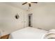 Bedroom with access to an ensuite bathroom and closet at 6147 Jellison Way, Arvada, CO 80004