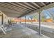 Covered patio area with outdoor seating perfect for relaxation and entertaining at 125 S Fulton Ave, Fort Lupton, CO 80621