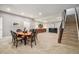 Spacious basement features a dining area and stair access at 24943 E Phillips Pl, Aurora, CO 80016