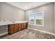 The wet bar has ample storage space, and lots of countertop space at 24943 E Phillips Pl, Aurora, CO 80016